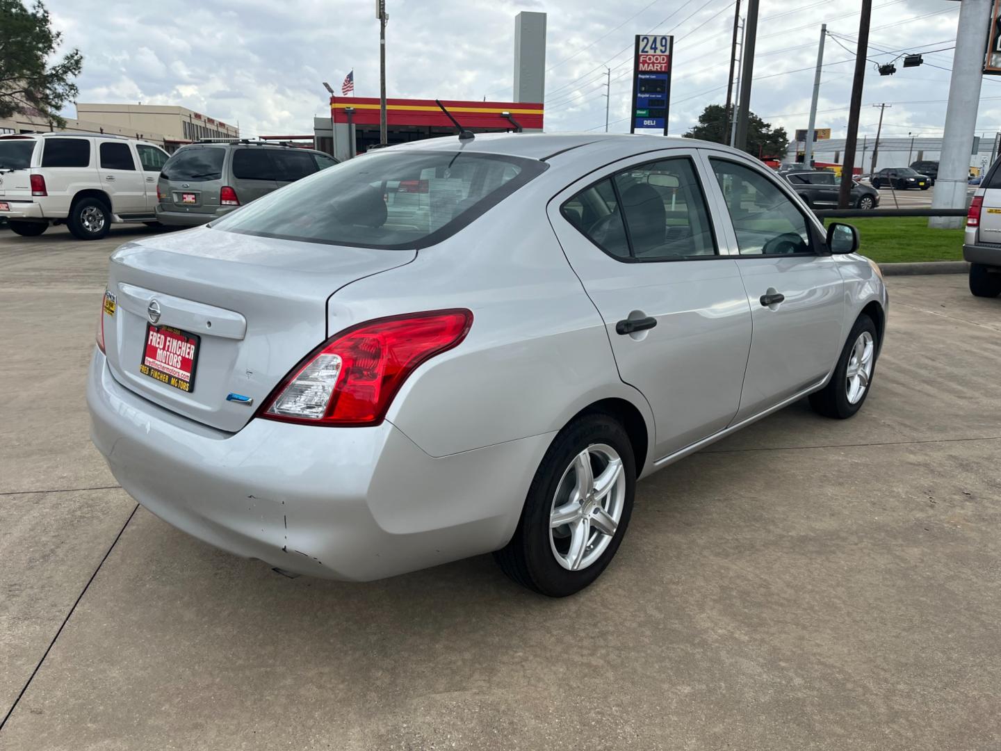 2014 SILVER /black Nissan Versa 1.6 S 5M (3N1CN7AP3EL) with an 1.6L L4 DOHC 16V engine, 5-Speed Manual transmission, located at 14700 Tomball Parkway 249, Houston, TX, 77086, (281) 444-2200, 29.928619, -95.504074 - Photo#6